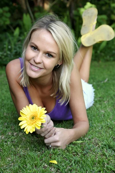 Gorgeous Woman with Yellow Flower