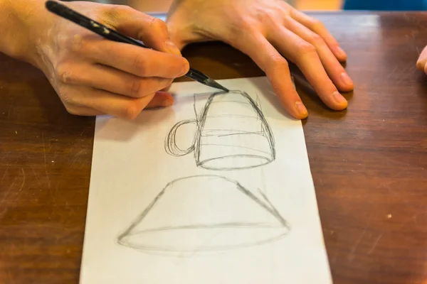 Woman hands drawing a draft