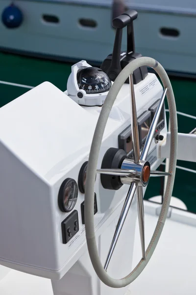 Sailing yacht control wheel and implement.