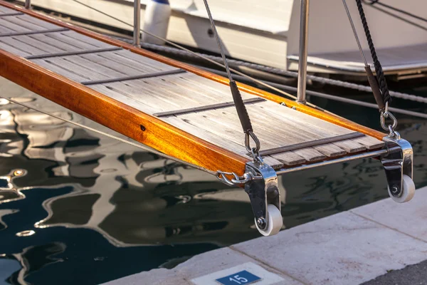 Wooden ladder on marine yacht