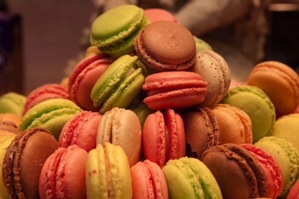 Traditional french colorful macarons in market