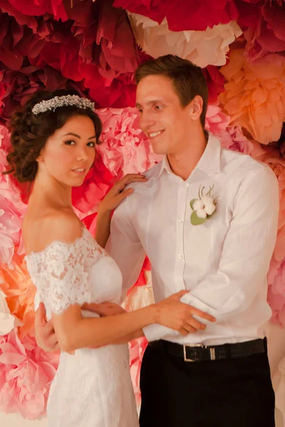 Young couple in wedding gown