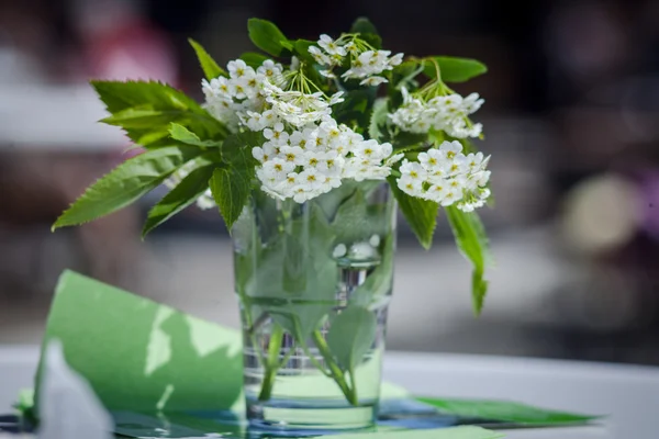 Bouquet of blooming summer flowers on the table