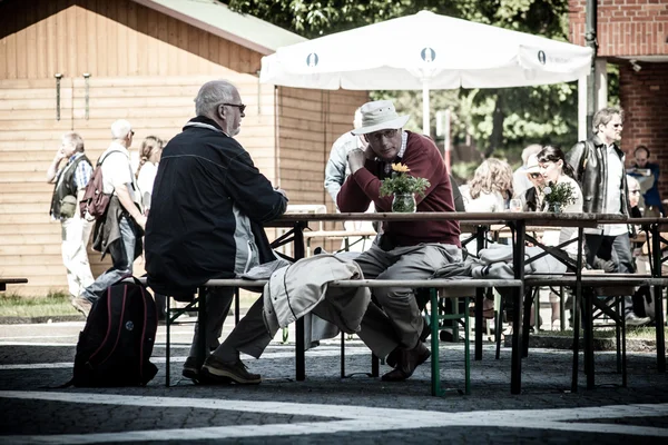 Cafe with people having dinner on Sunday