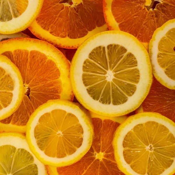 Healthy fresh food background. Lemon and orange.