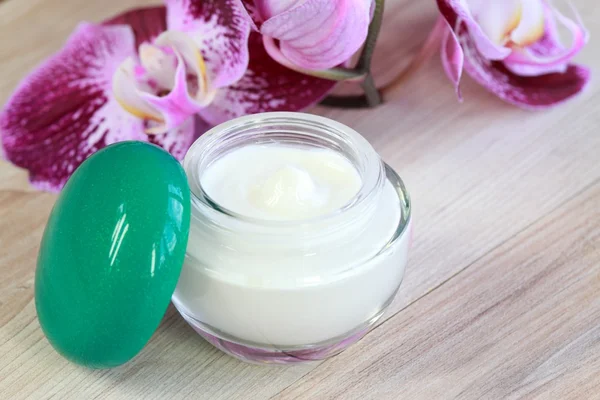 Face and body cream with orchid