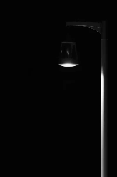 Bright Lit Outdoor Lantern Lamp Pole Post, Lonely Concept Solitude Metaphor, Illuminated Window Light, Vertical Deserted Night Park Scene Closeup, Black Isolated Copy Space Background