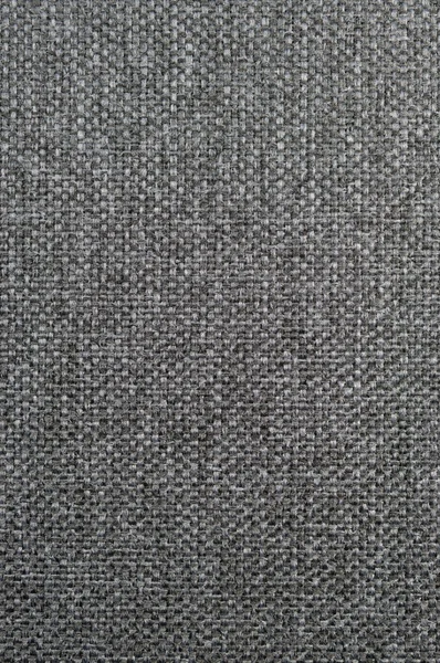 Natural textured vertical grunge dark grey black burlap sackcloth hessian, gray upholstery sack texture decor, grungy decorative vintage canvas large detailed bright pattern macro background closeup
