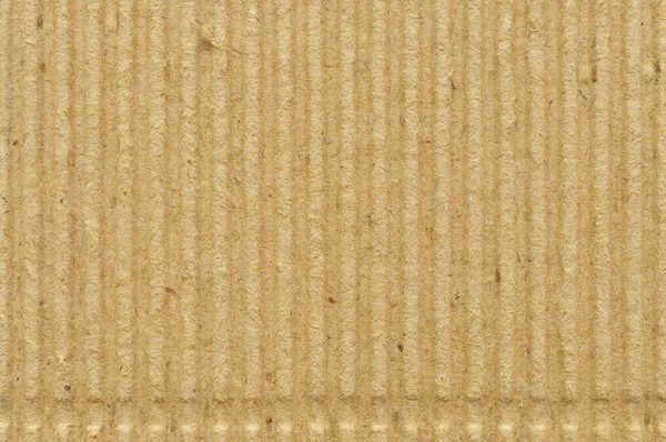 Corrugated cardboard goffer paper texture rough old recycled goffered textured blank empty grunge copy space background aged grungy macro closeup taupe brown yellow beige horizontal vintage pattern