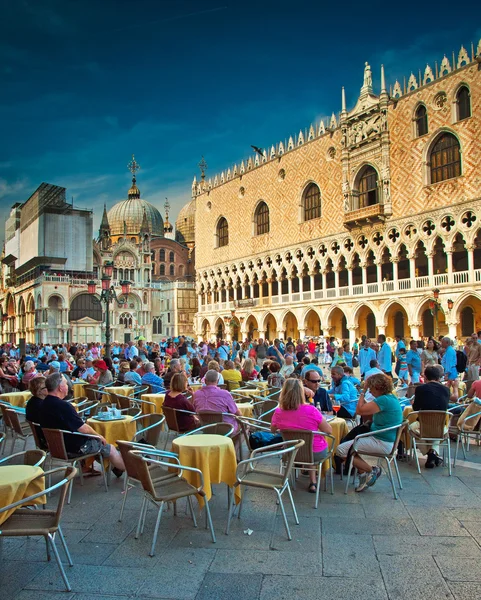 People sitting at St Mark square