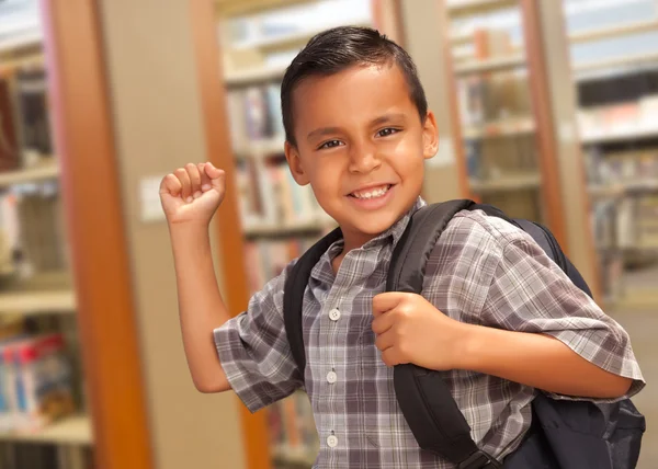 Hispanic Student Boy with Backpack in the Library