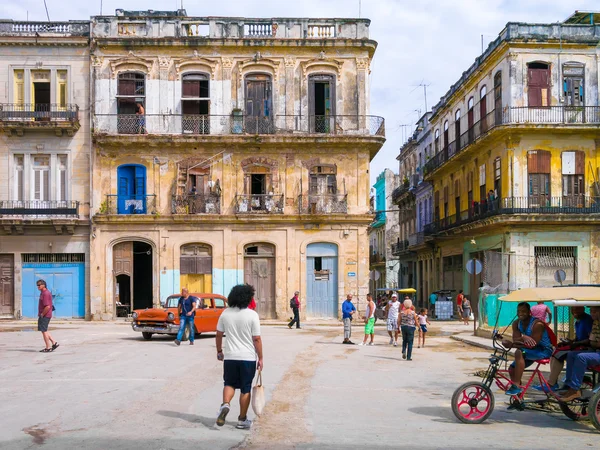 People and decaying buildings