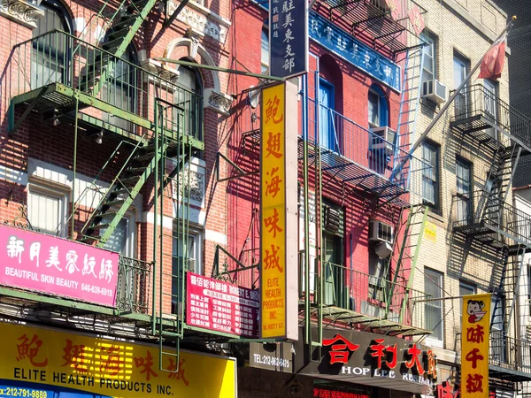 Buildings with chinese signs at Chinatown in New York City