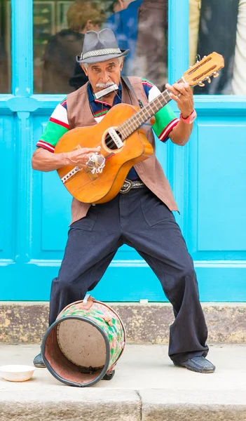 Guitarist playing traditional music in Old Havana