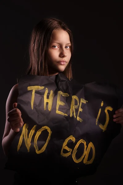Atheist teen girl holding a banner with the inscription