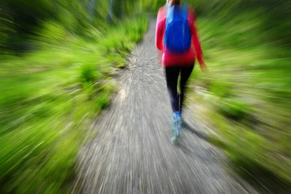 Fit Woman Hiking in Mountains Wilderness