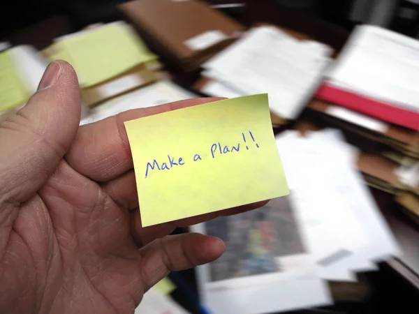 Messy Office with Make a Plan Note