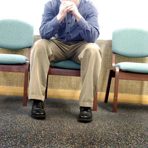 Man in Hospital Waiting Room