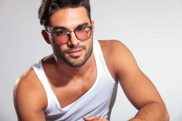 Cute fit man with glasses