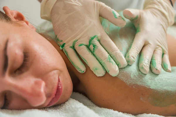 Woman Receiving A Mud Therapy