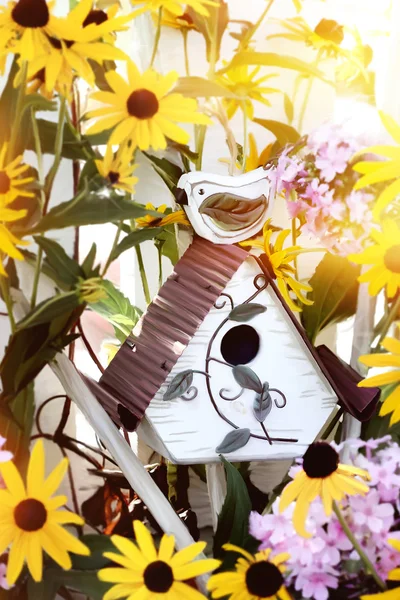 Birdhouse in Flowers