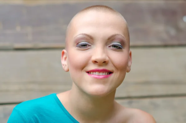 Happy and young cancer survivor after successful chemotherapy