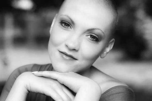 Happy and young cancer survivor after successful chemotherapy