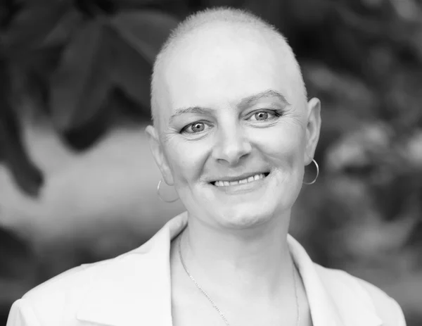 Bald woman - cancer survivor