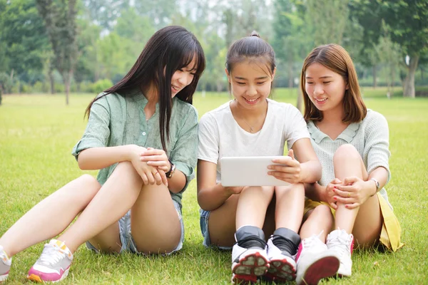 Three female students in outdoor