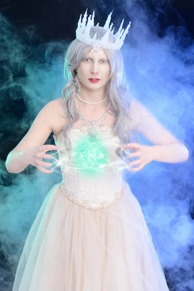 Evil ice queen with ball of magic