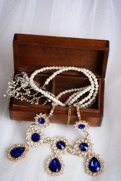 Top view vintage necklaces with jewelry box