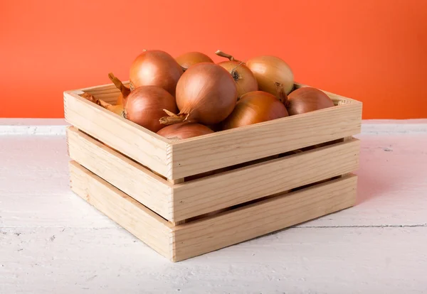 Onions on wood crate