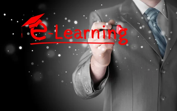 Business man writing e-learning concept