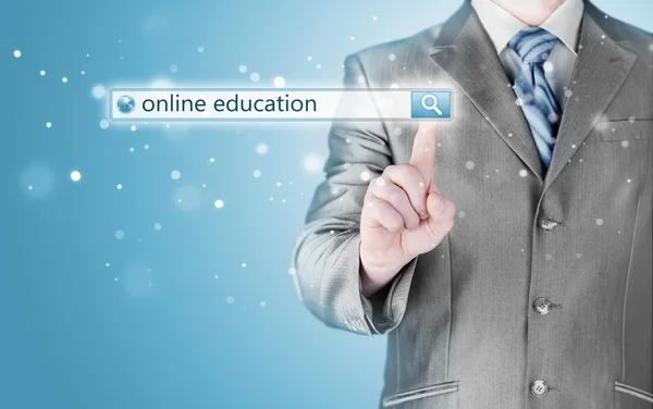 Online education written in search bar on virtual screen.