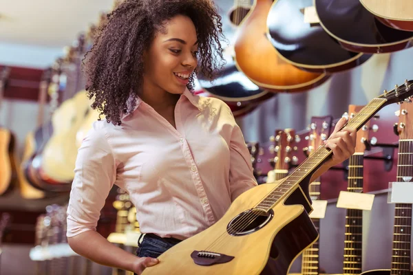Woman in musical shop