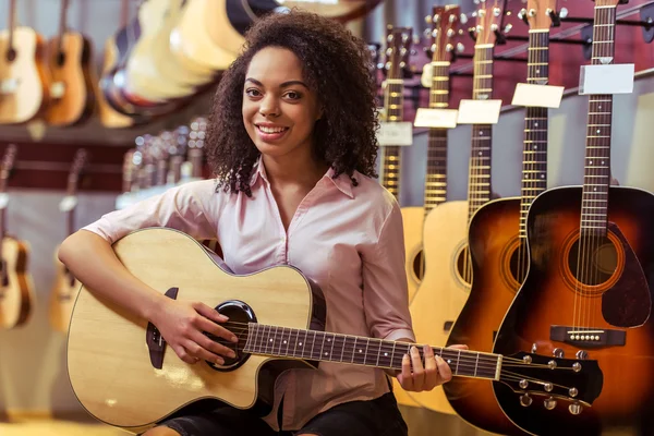 Woman in musical shop