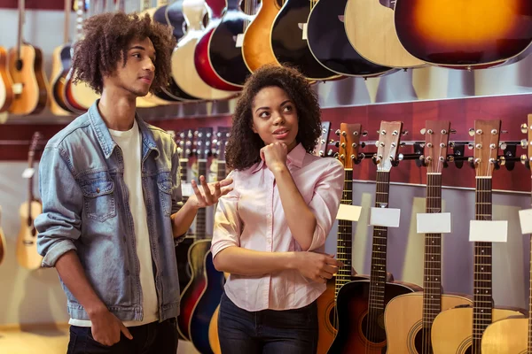 People in musical shop