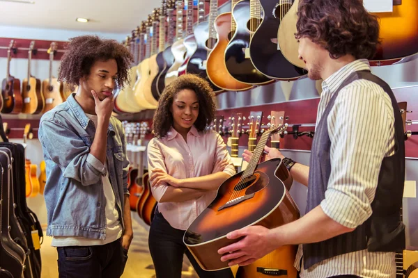 People in musical shop