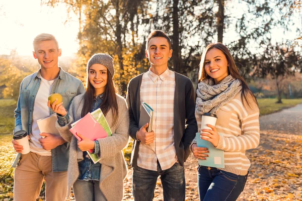 Students in autumn park