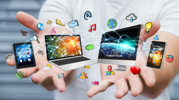 Businessman connected tech devices and icons applications