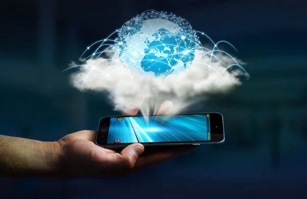Digital world in a cloud connected to businessman mobile phone
