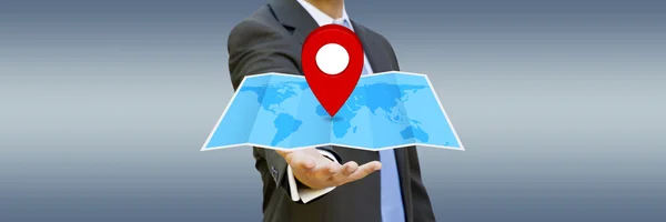 Businessman holding digital map in his hands