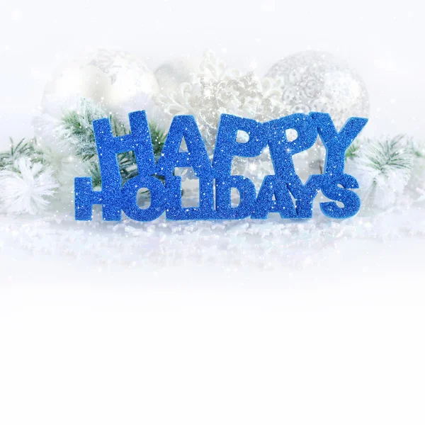 Inscription of happy holidays with christmas decorations