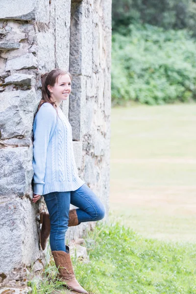 Girl Leaning on Wall