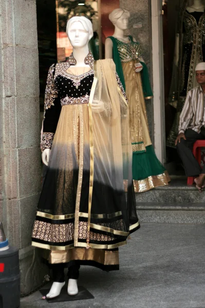 Mannequin dressed in Indian Fashion dress in front of retail shop