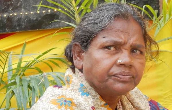 Closeup portrait of poor Indian woman seeking help