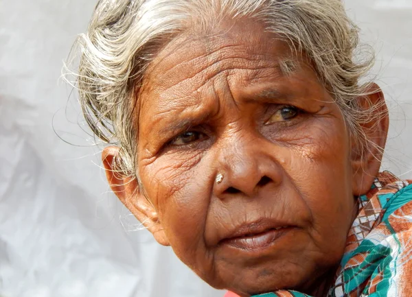 Closeup portrait of poor Indian woman seeking help