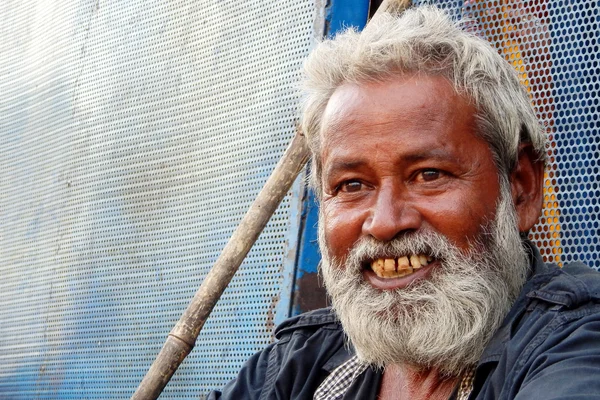 Portrait of Senior homeless poor Indian man