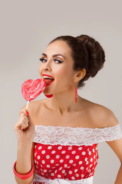Happy Woman Lick Red Lollipop. Pin-up retro style.