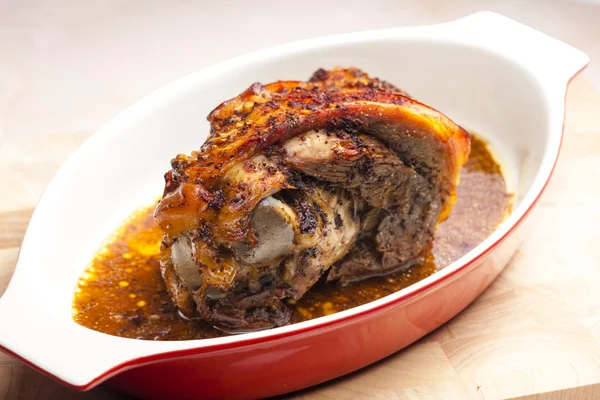 Marinated, cooked and slowly baked pork knee